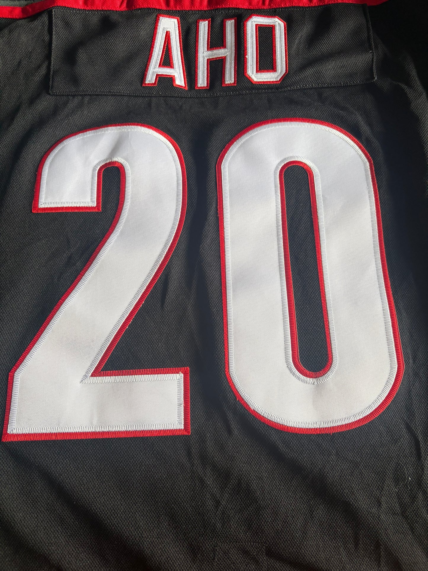 Carolina Hurricanes NHL Shirt Size Large Aho Black A 20