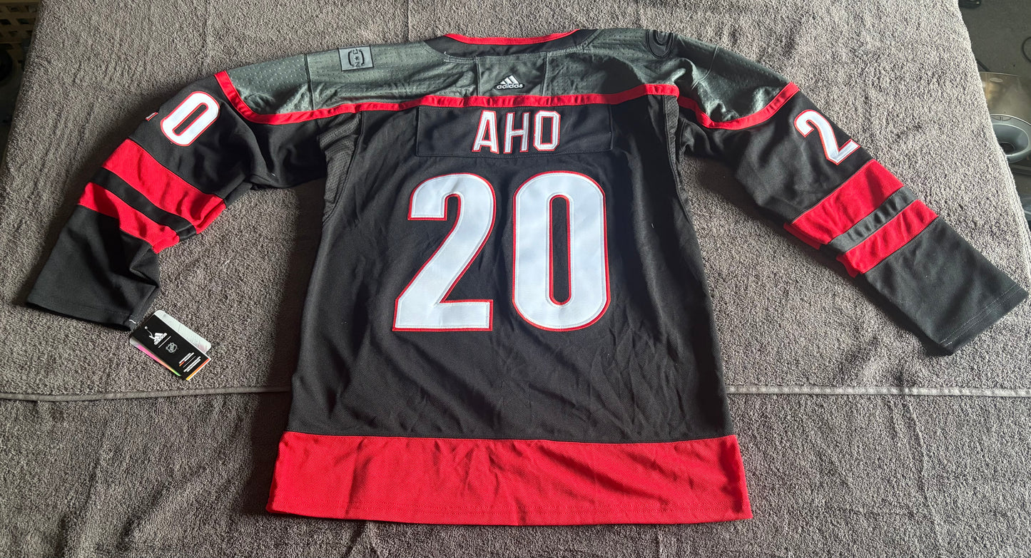 Carolina Hurricanes NHL Shirt Size Large Aho Black A 20