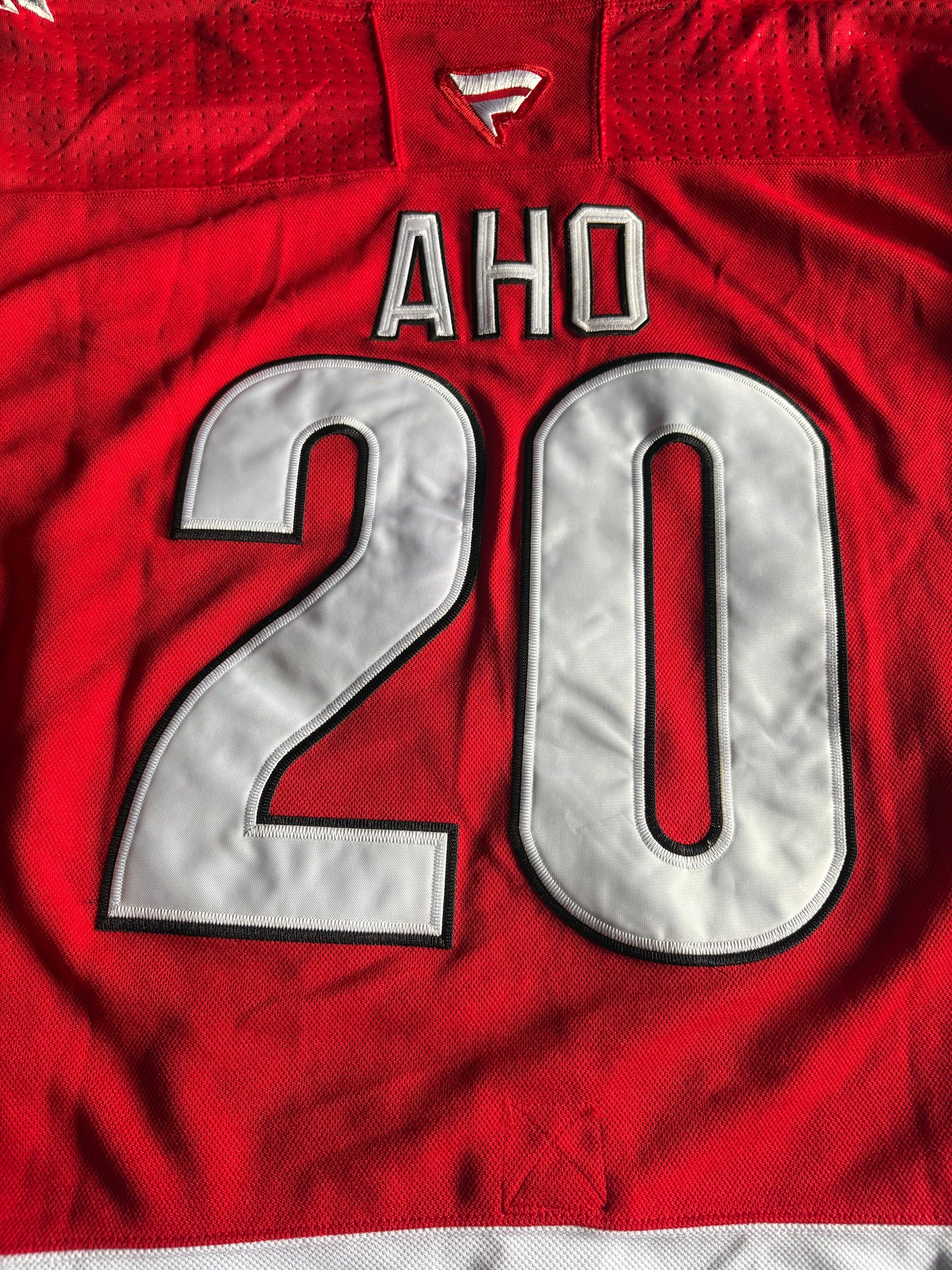 Carolina Hurricanes NHL Shirt Size 52 Aho Red A 20