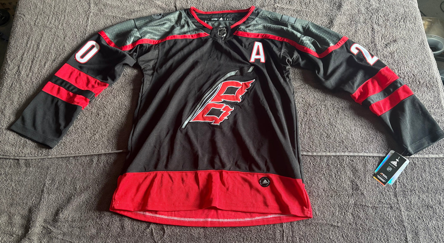 Carolina Hurricanes NHL Shirt Size Large Aho Black A 20