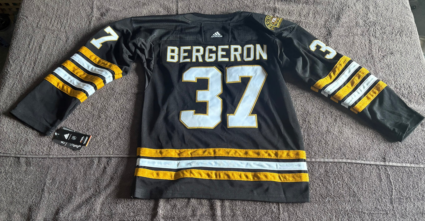 Boston Bruins Vintage NHL Shirt Size Large Bergeron 37 C Black & Yellow